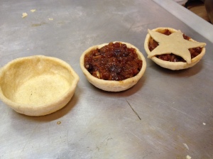Mini pie shells in each phase of production.